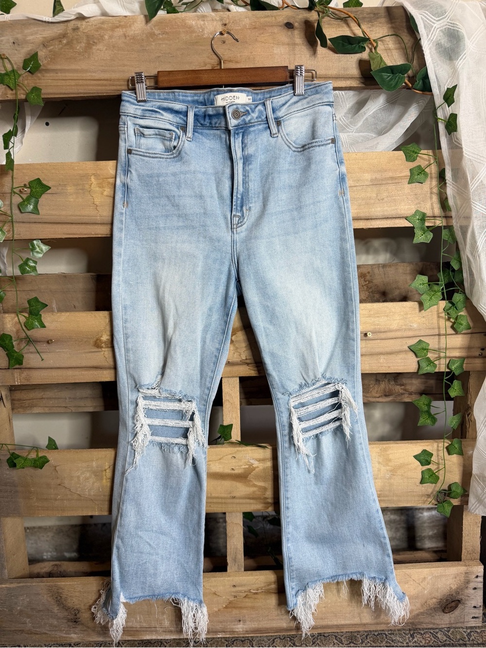 Light Wash Distressed Women's Jeans with Raw Hem